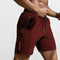 Side Pose of Model Wearing Wine Red GPW Men's Stylish Polyester Athletic Shorts with Elastic Waist