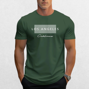 Green t-shirt with 'Los Angeles California' text on a white background